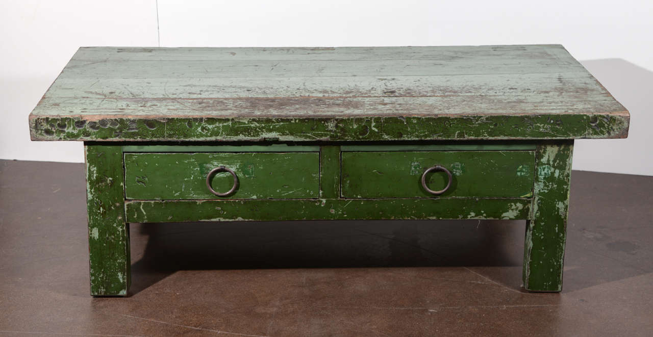 Wabi Sabi Green Coffee Table
Original green patina with distressed wood
Two Drawer, cast iron hardware with dove tail drawers. 
Circa, 1900
 
Measurement of shelves: 4.5