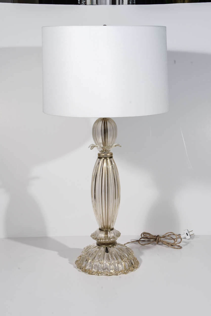 Pair of pale gold Murano glass lamps, by Seguso, circa 1950's.

Measurement is glass body only