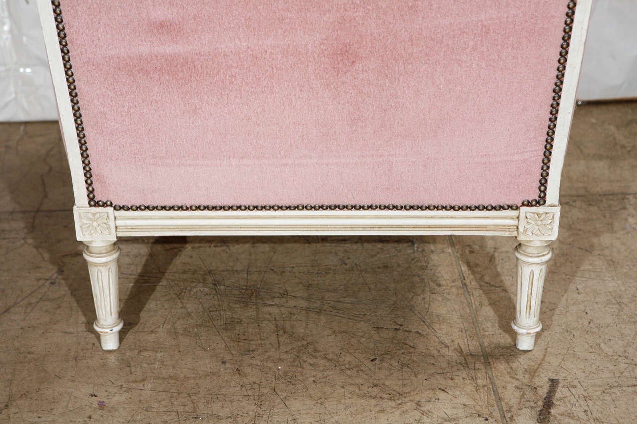 The Majestic Louis XVI Armchair: A Symbol of Regal Elegance