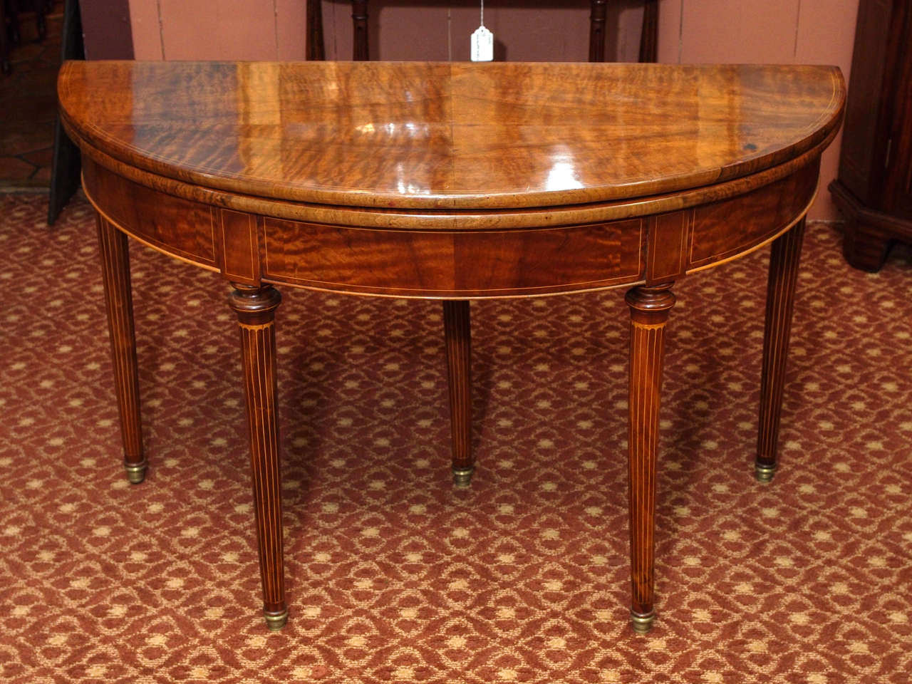 Exceptional French Louis XVI/Charles X transition faded mahogany demi-lune table with lemon wood inlay