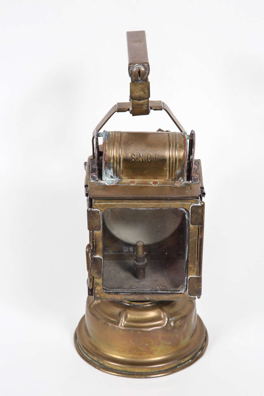 Used by station masters to signal approaching trains. This is brass lantern was used by the French SNCF line.