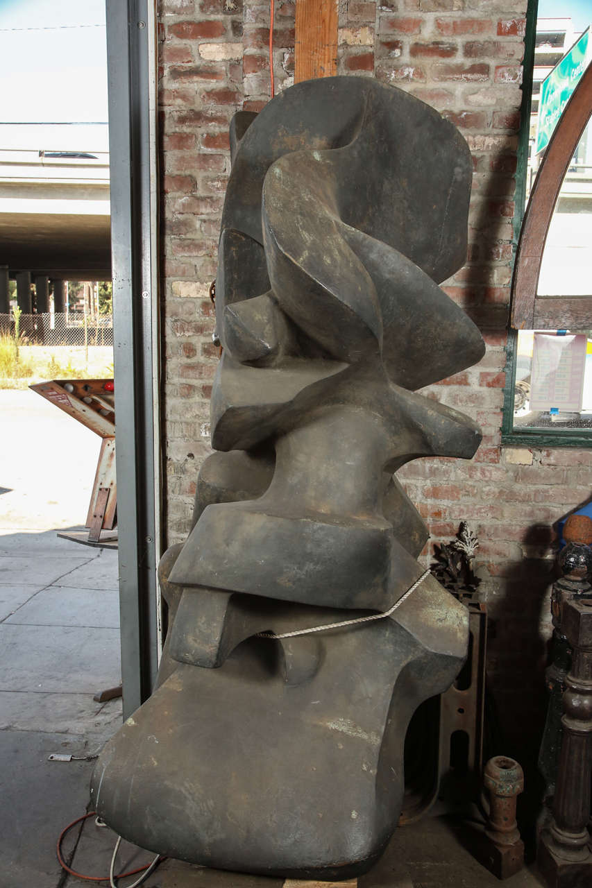 This large bronze sculpture signed 'Firschein 1974' adorned the outside corner of a building in Long Island City, New York. It is bronze with original dark patina. Weighs approximately 600 lbs.