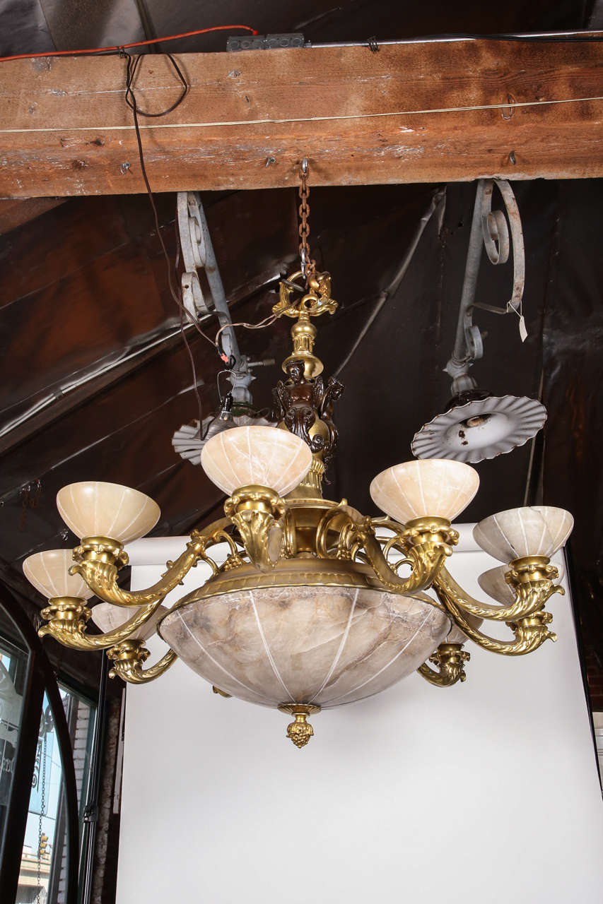 Large-scale bronze and alabaster chandelier.