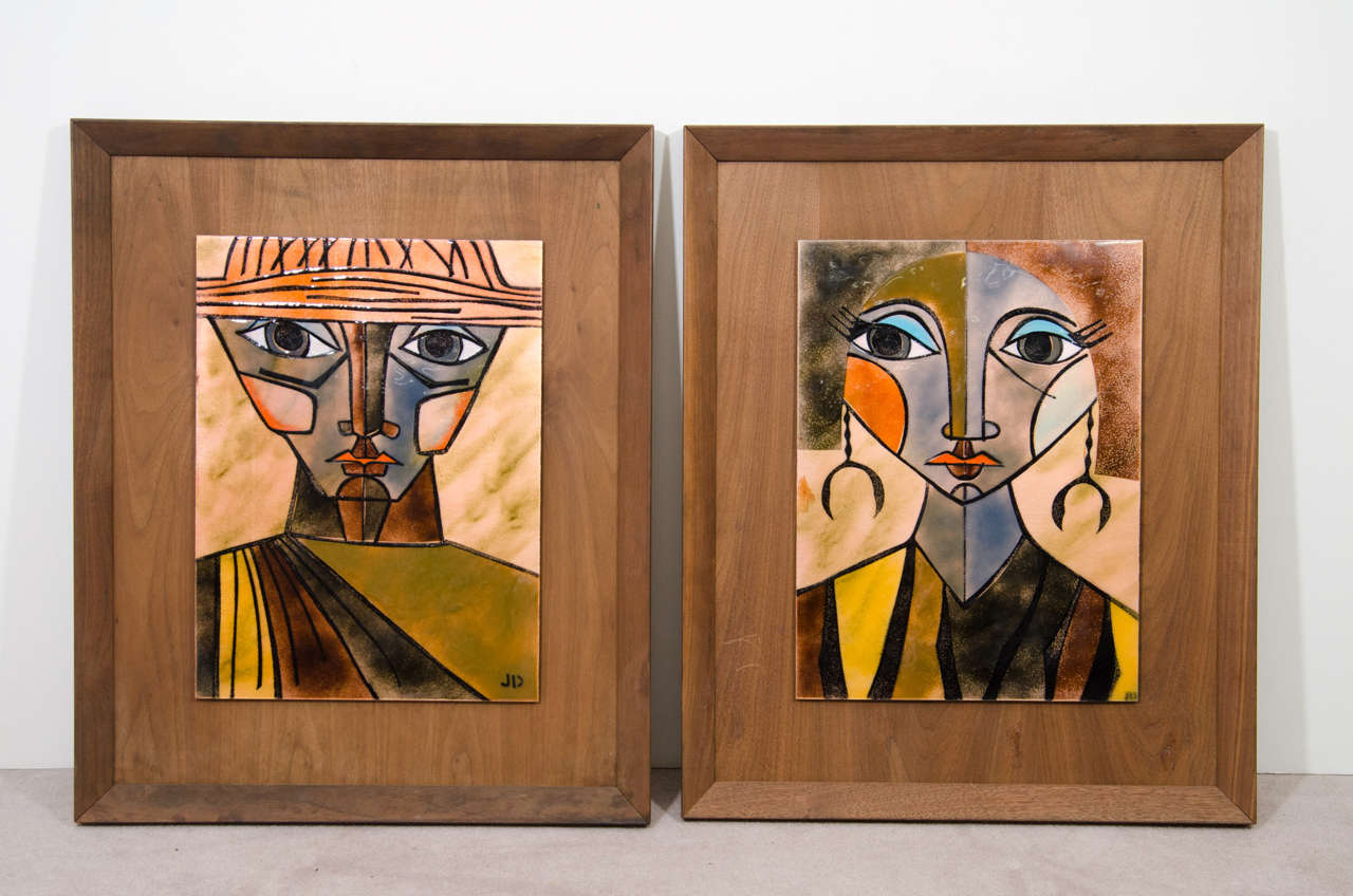 A pair of vintage abstract portraits of a man and woman in enamel on a wood frame by Judith Danner.

Reduced from $975