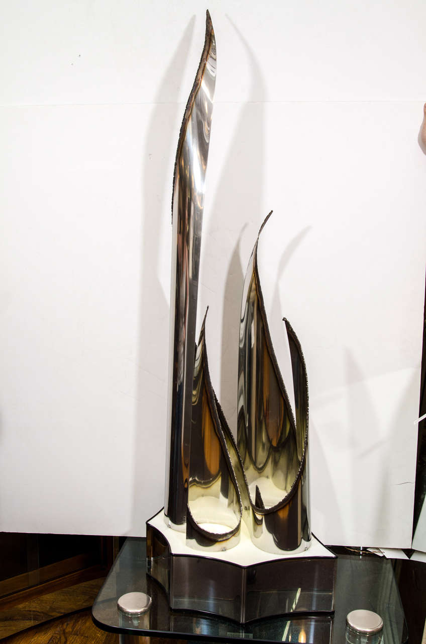 Great Abstract Brutalist form metal and plexiglass light sculpture signed by Angelo Lelli who worked for the Italian design firm Fontana Arte two slight age cracks in the plexiglass of the Base,that really do not detract from this Incredible and