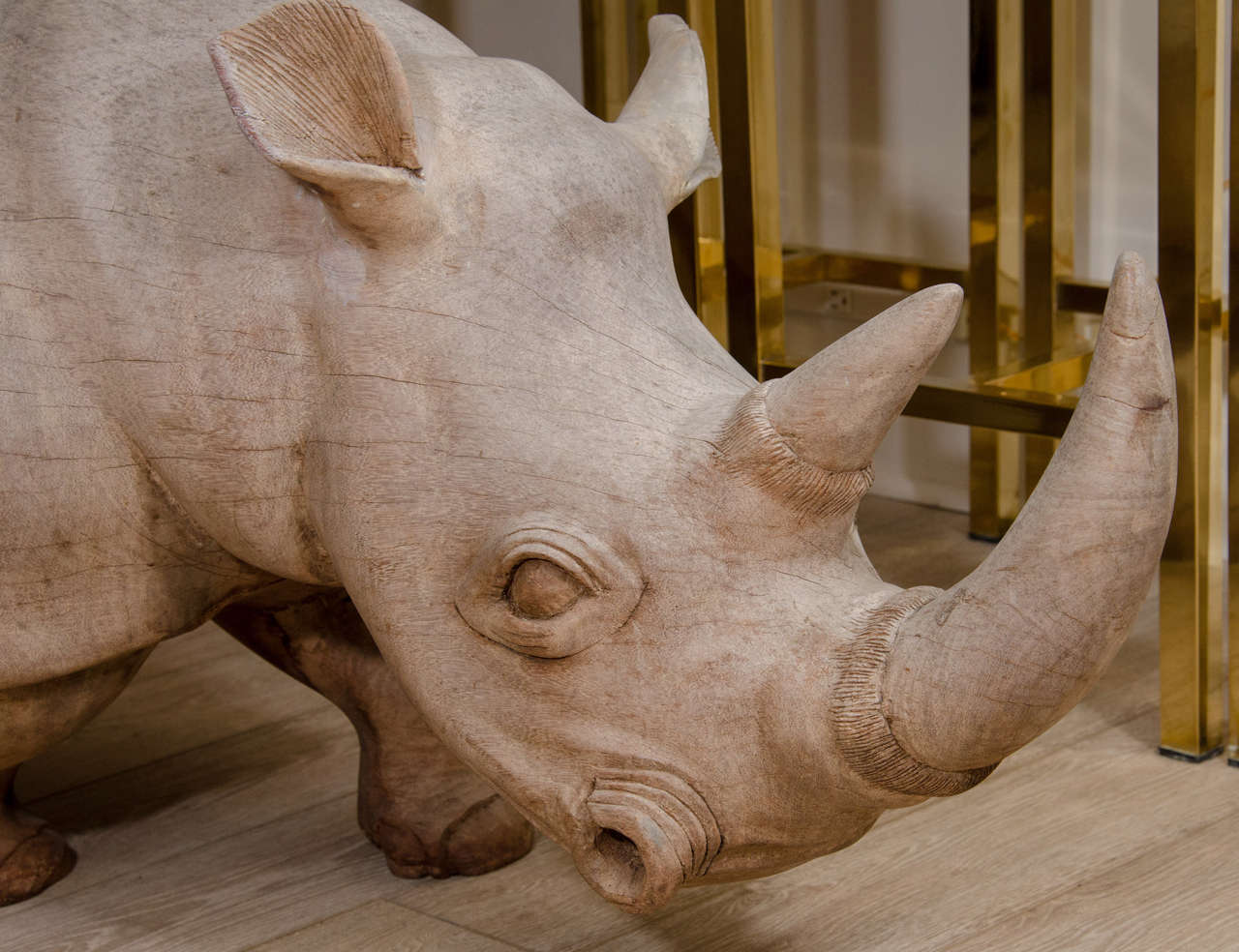 wooden rhinoceros sculpture