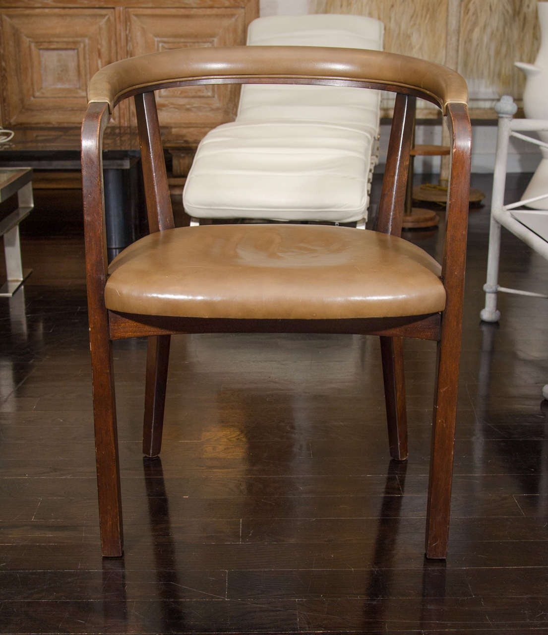A Dunbar arm chair with mahogany frame and olive leather.
A great chair for a dressing table or desk.