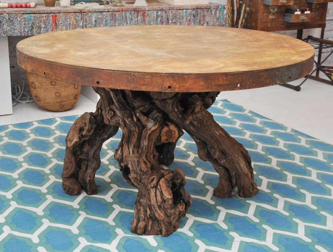 One of a kind root base table with copper top. Truly a conversation piece!