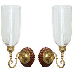 pair of 21st c.brass sconces with glass shades