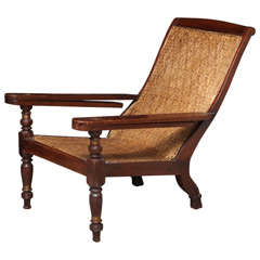 antique plantation chair in teakwood
