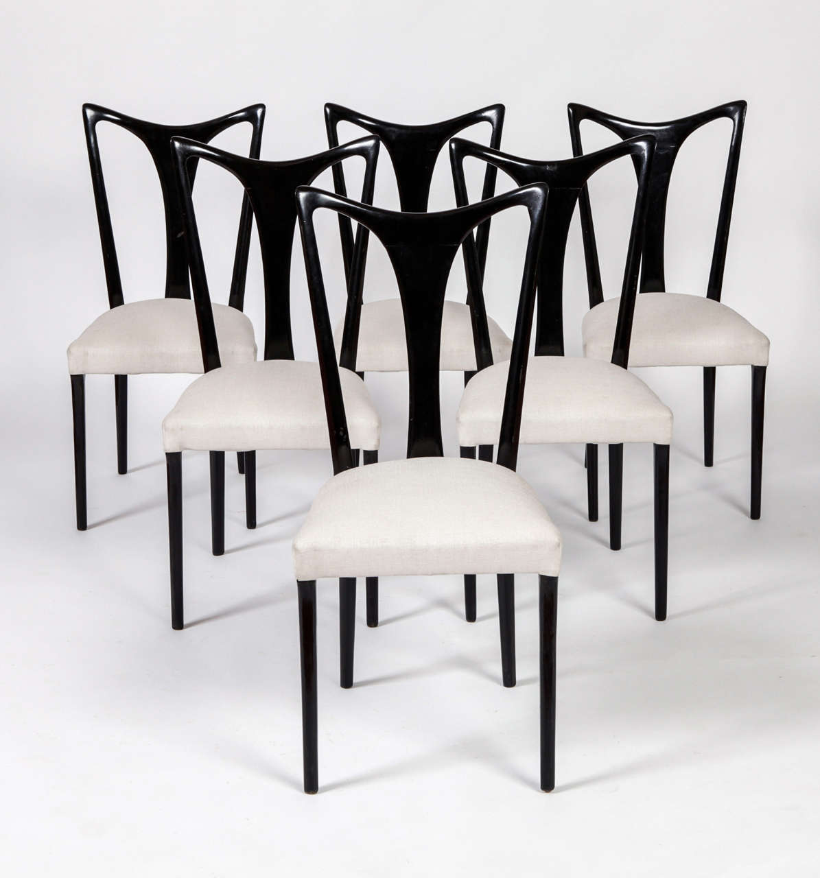Important set of 6 dining chairs designed by Guglielmo ULRICH ;Black laquered mahogany and white cotton