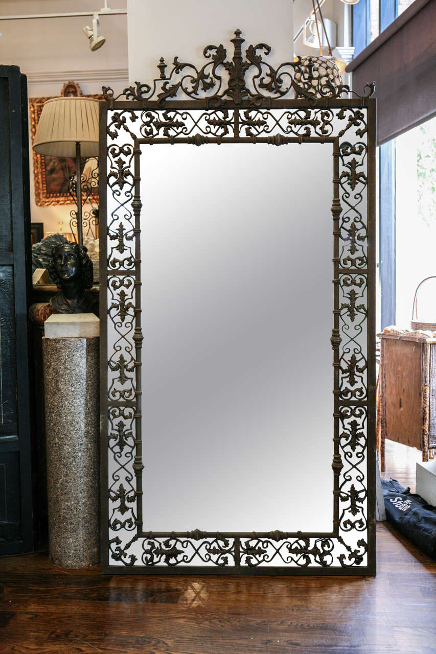 Original cast metal frame with replaced mirror.