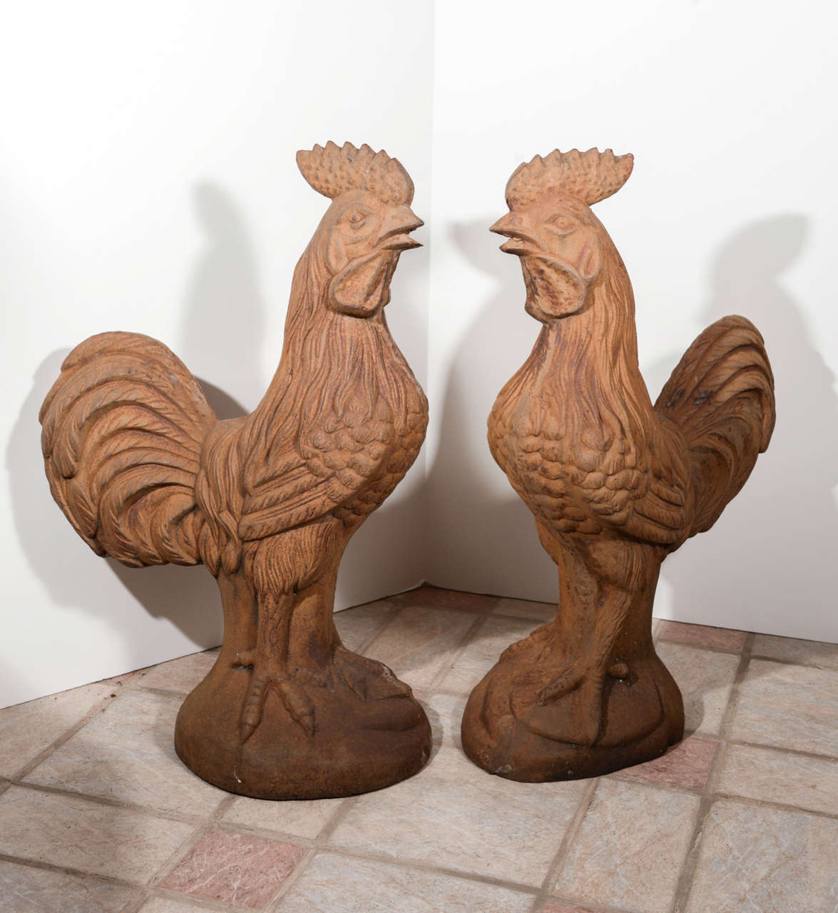 pair of late 19th c iron terracotta color outdoor roosters
