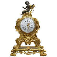 Engraved Gilt and Patinated Bronze Table Clock
