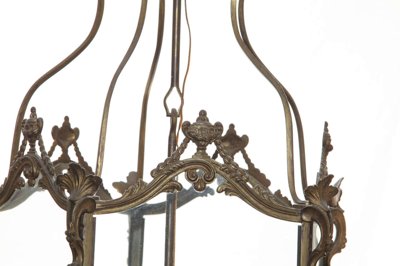 A Louis XV style gilt bronze hexagonal hall lantern with three lights.