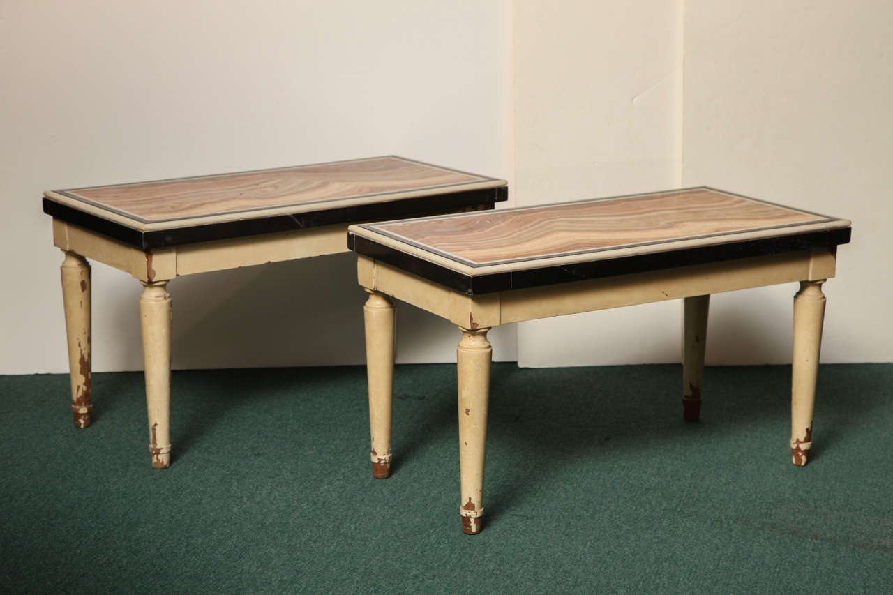 Pair of highly decorative Italian inlaid marble top low tables with painted wood feet.
Stock Number: F98