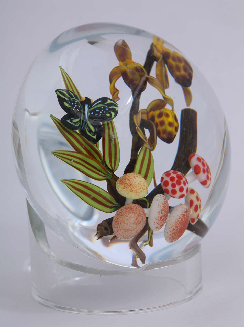 A beautiful Colin Richardson paperweight with three lady slipper orchids, mushrooms and butterfly