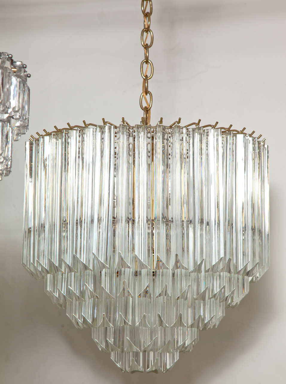 Fantastic large cascading five-tier crystal prism chandelier on a heavy brass chain and canopy. Imported from Italy and sold through Camer glass, NYC.
Crystal body measures 21
