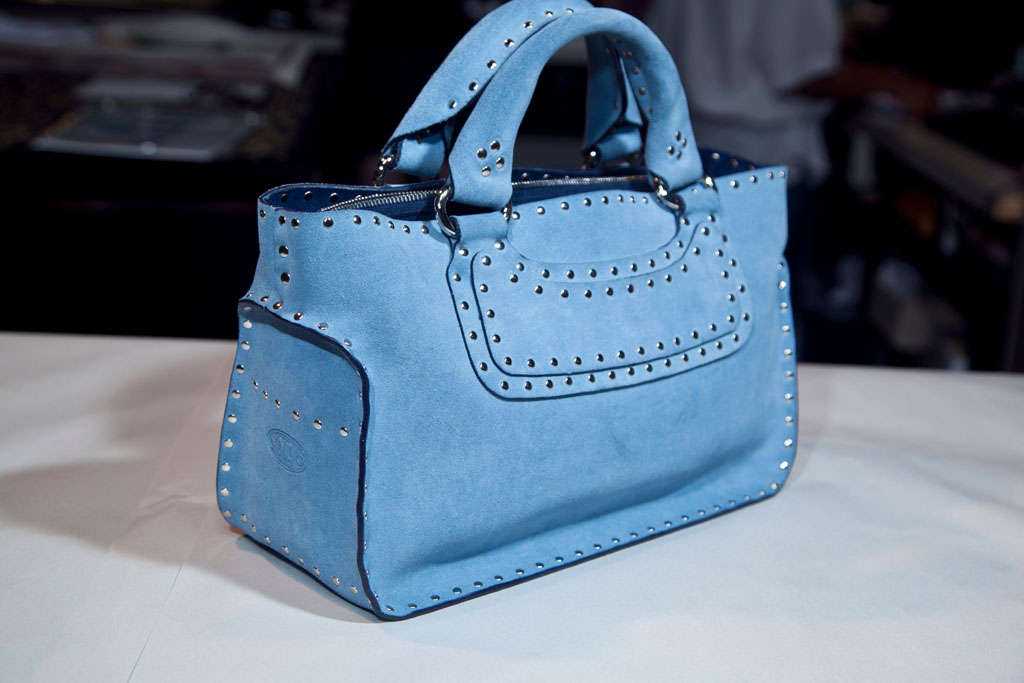 funkyfinders shares this stunning handbag featuring a gorgeous sky-blue luscious suede surround complimented with silver studs: adding a design of their own. this pieces defines timeless fashion flare. it'll instantly transfrom your wardrobe to