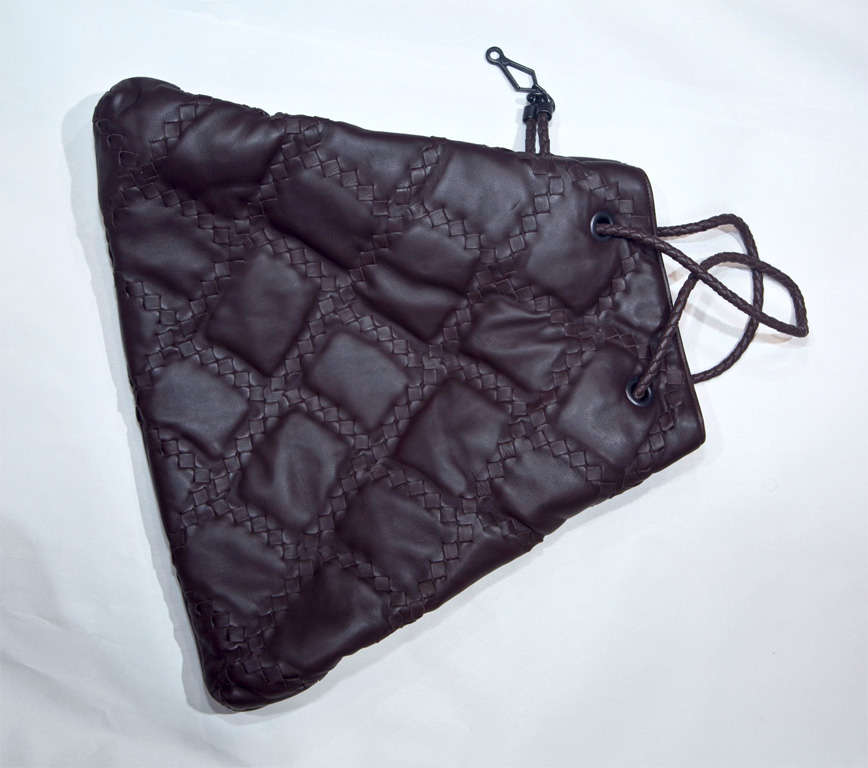 this is a funkyfinders 'fashion feature' as we've never seen the style before. the purse is large yet comfy. the dark brown famous lux leather surround features signature woven leather blocking on a solid surround. twin shoulder straps are