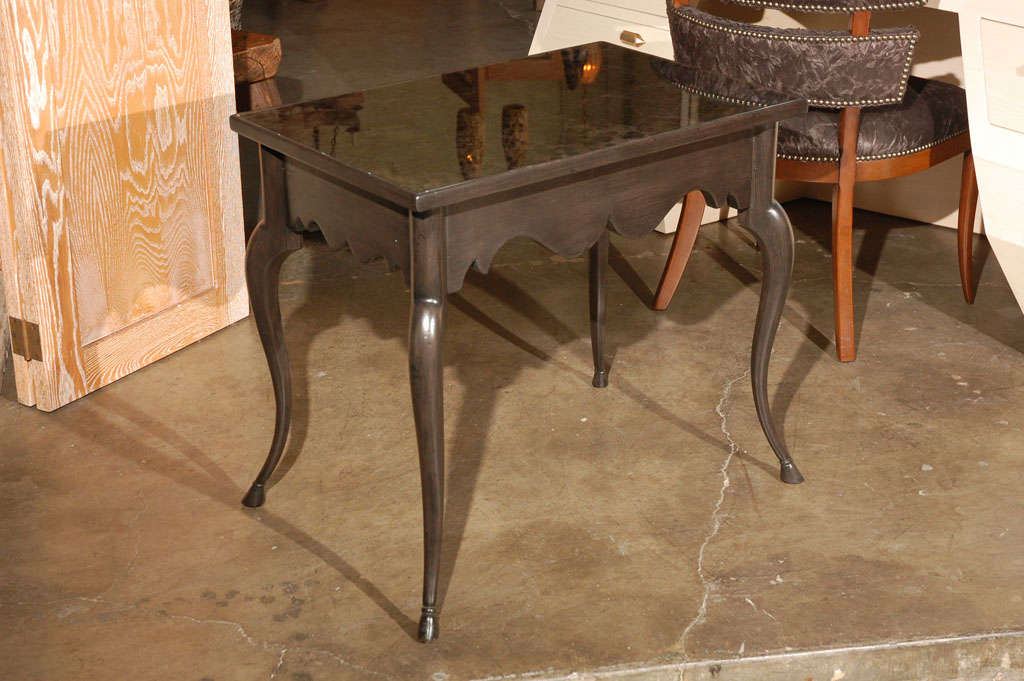 Paul Marra Cabriole leg side table finished in black antique, and with new inset antiqued amethyst mirrored top, one drawer. By order, inquire.