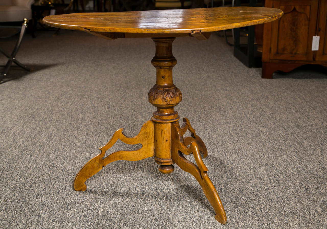 Unique tripod base tilt top wine tasting table European early 1900's.