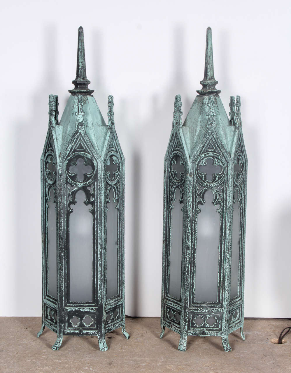 Pair of Gothic table lamps or pier lamps which were originally wall sconces (could still be used as wall sconces). Hexagonal design with fabulous patina. The patina is original and highly textured from decades of weathering.