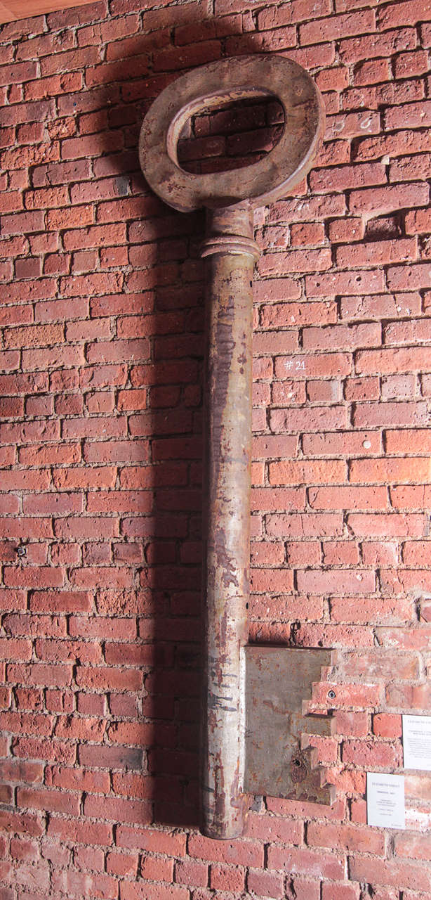 American, early 20th century trade sign, depicting an extremely large key. Unique with excellent old patina, perfect piece of folk art.