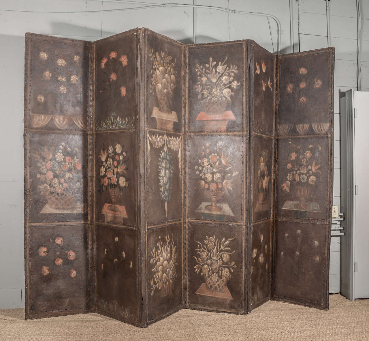 Late 17th century Venetian folding screen, oil on canvas (over restored pegged mortise and tenon wood frame) with fruit compote and floral décor motifs painted on six panels.