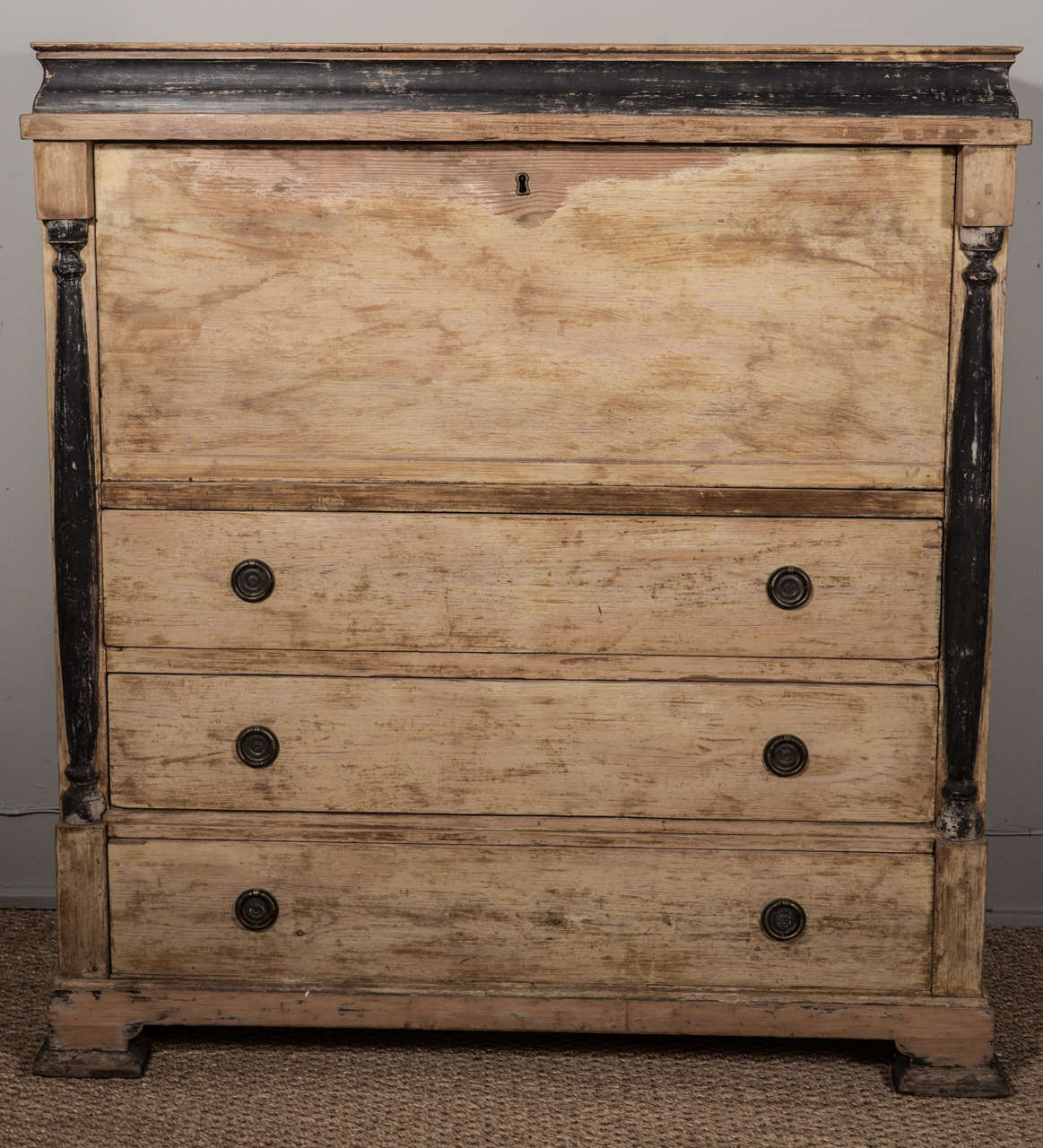 Early painted Swedish secretary desk (circa 1810-1830: drop-front reveals sixteen small compartments and wide three lower drawers. Painted finish is original with only minimal restoration to ebonized portion. Features include working lock and key,