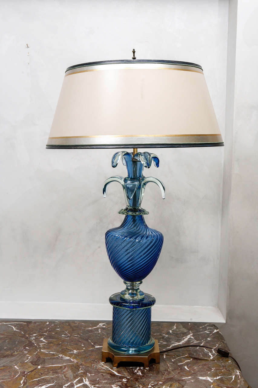Pair of Vintage (1940's - 1950's) Murano Salviati Lamps in Blue.  The Shades are included and are Hand Made of Parchment Paper. They are Hand Gilded and Decorated. The measurement to the top of the finial is 36 inches and the base measurement is 6.5