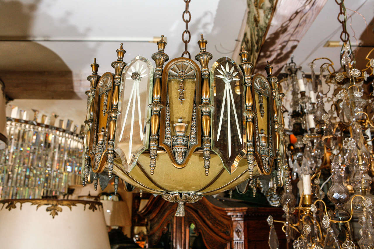 1930s Bronze, Mirror and Glass Chandelier with very fine chasing and detail. Possibly Caldwell (New York). This chandelier has been newly wired.