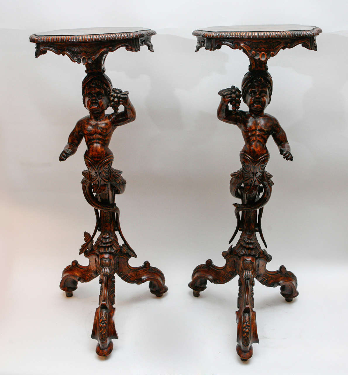 Pair of 19th century Italian Walnut Carved Moor Pedestal/Tables