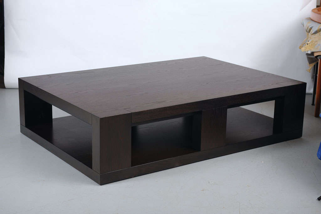 Low cocktail table with storage space underneath.