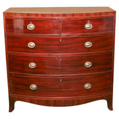 George III mahogany cross-banded bow front chest of drawers