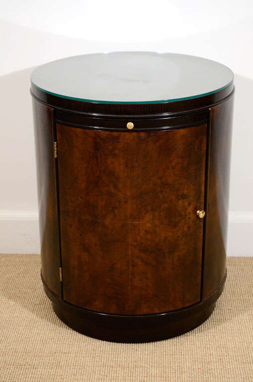 A Pair of Drexel Drum Shaped End Tables, with glass tops.