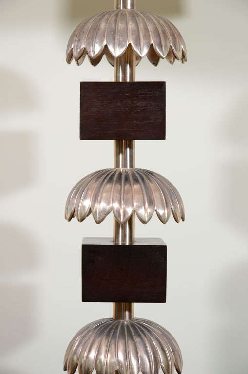 American A Pair of Silvered Metal and Wood Table Lamps.