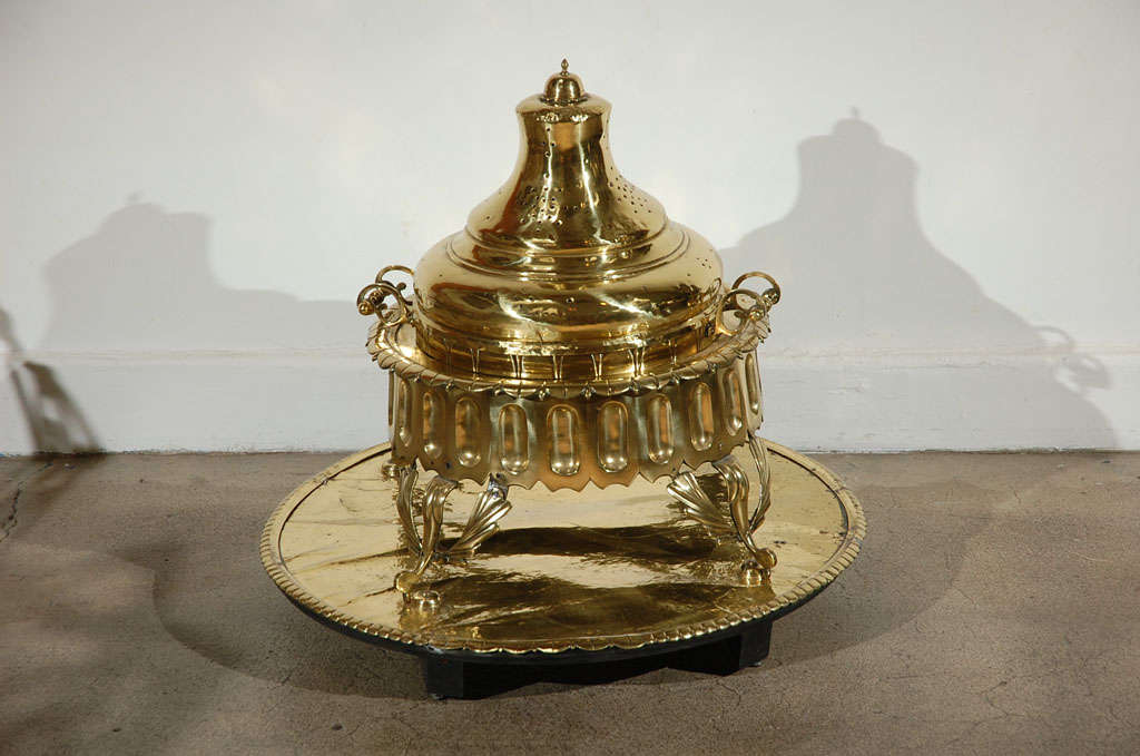 Large antique Middle Eastern incense burner or fire pit with pierced brass and solid brass ornamentation.
Museum quality piece footed incense censer.
Functional and beautifully adorned, rare to find complete with lid and base.
This Moorish Islamic