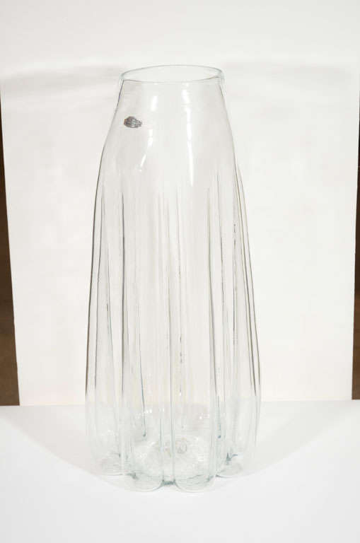 Exceptional hand blown, gored clear glass floor lamp by Blenko