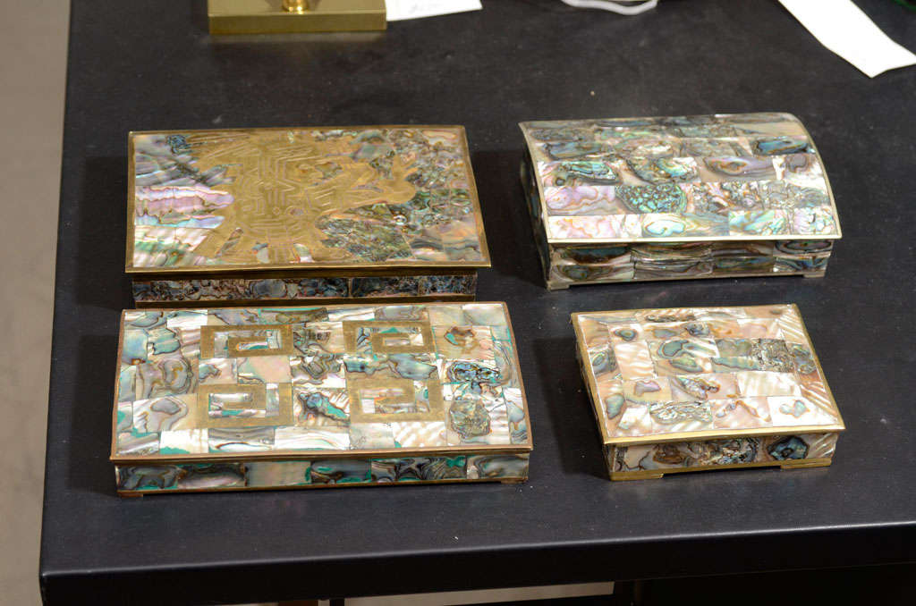 Four Abalone and Brass Boxes