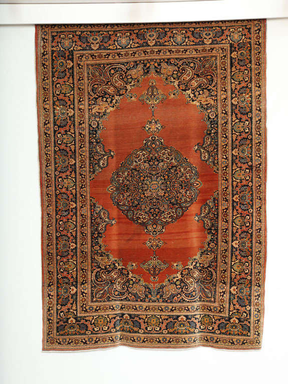 This 1890 Haji Jalili Persian Tabriz rug consists of a cotton warp, handspun wool weft and hand-knotted handspun wool pile. The bright copper hues, soft blues, indigos, cream and beige tones were all created using organic vegetable dyes. With its