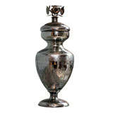 Mercury glass and embossed metal jar