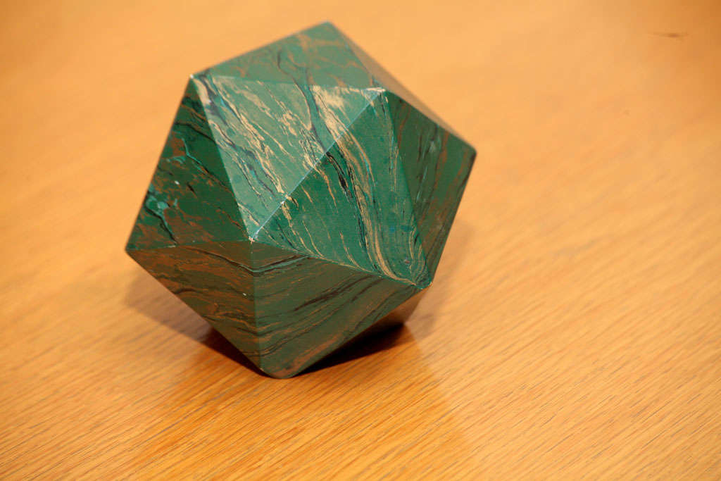 This is a beautiful marblized polyhedron weight. Great patina.