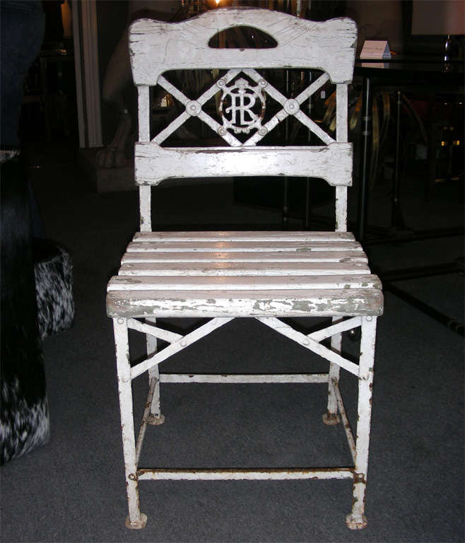 Eight 1880s garden metal and wood chairs, from the restaurant 