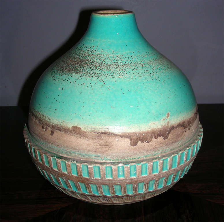 1930's ceramic vase with turquoise-blue glaze on natural background. Signed Jean Besnard.

