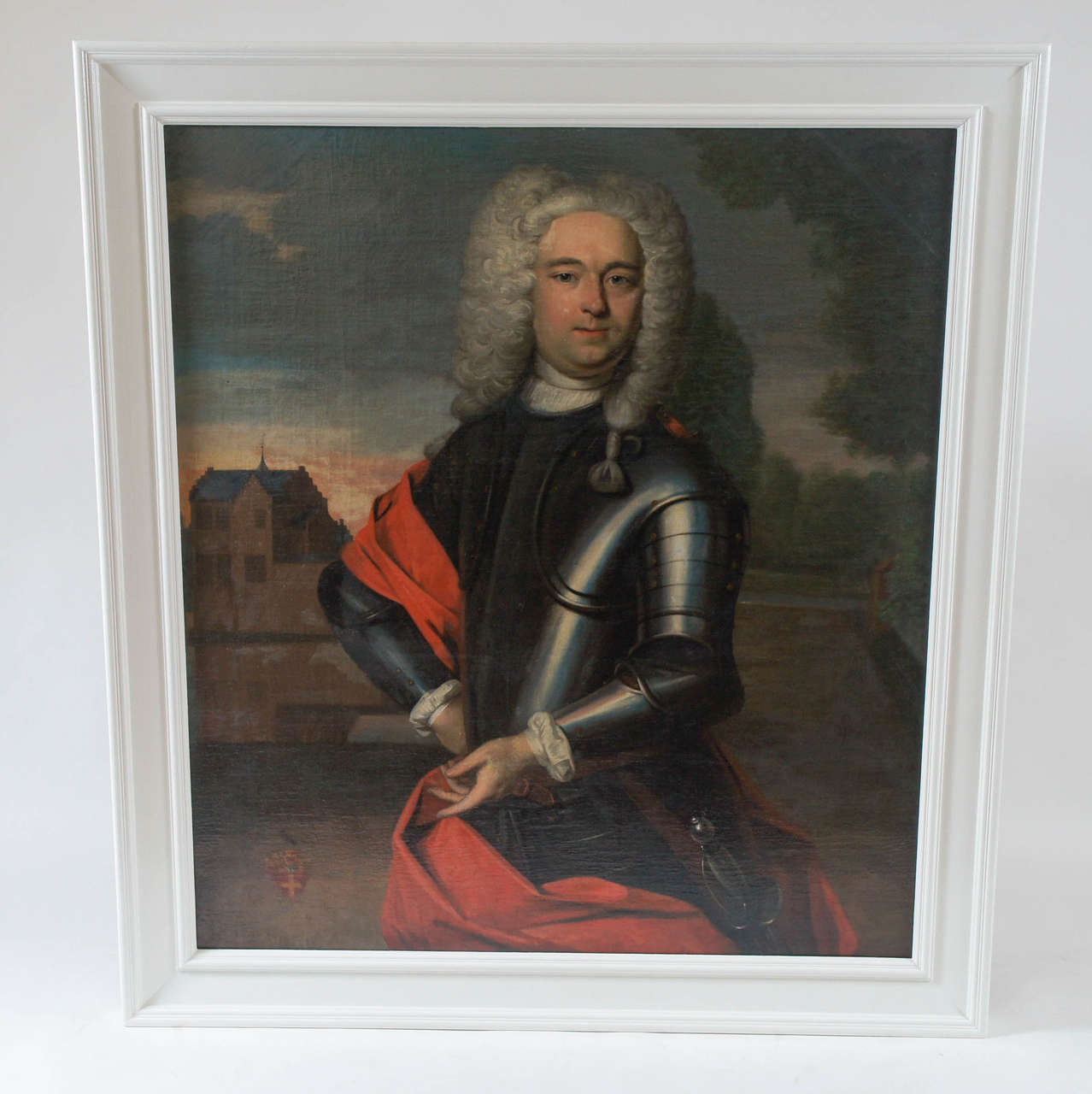 Exceptional quality oil on canvas portrait painting of a bewigged Dutch statesman in armour having architectural background of ancestral seat with heraldic crest at lower left. Later inscription to the reverse of period relined-canvas giving