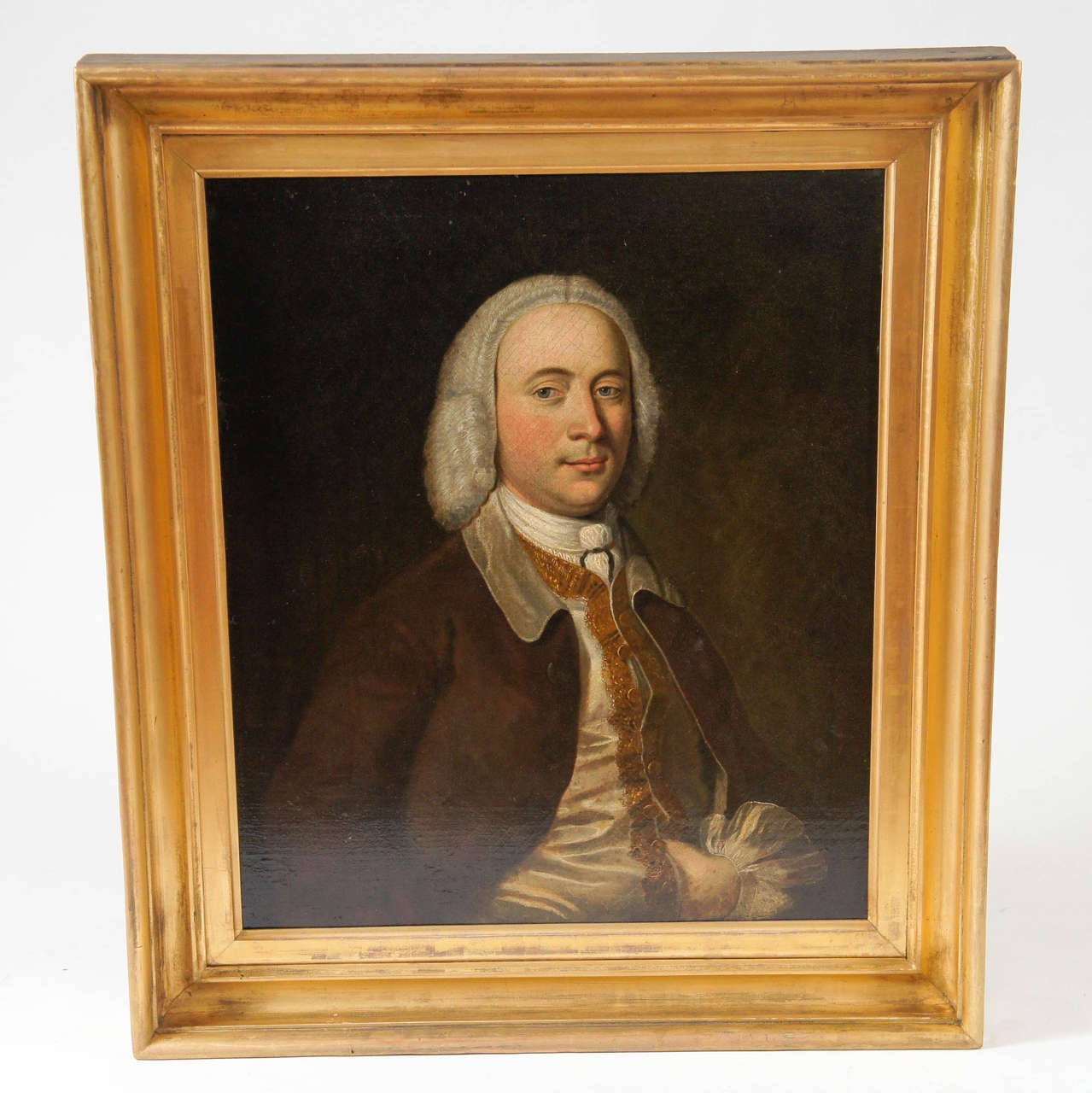 English George II period oil on canvas of a gentleman exhibiting exceptional technical skills of detail and form. Unsigned. Fine mid-19th-century ogee-moulded giltwood frame with original finish. Canvas measures 30.25