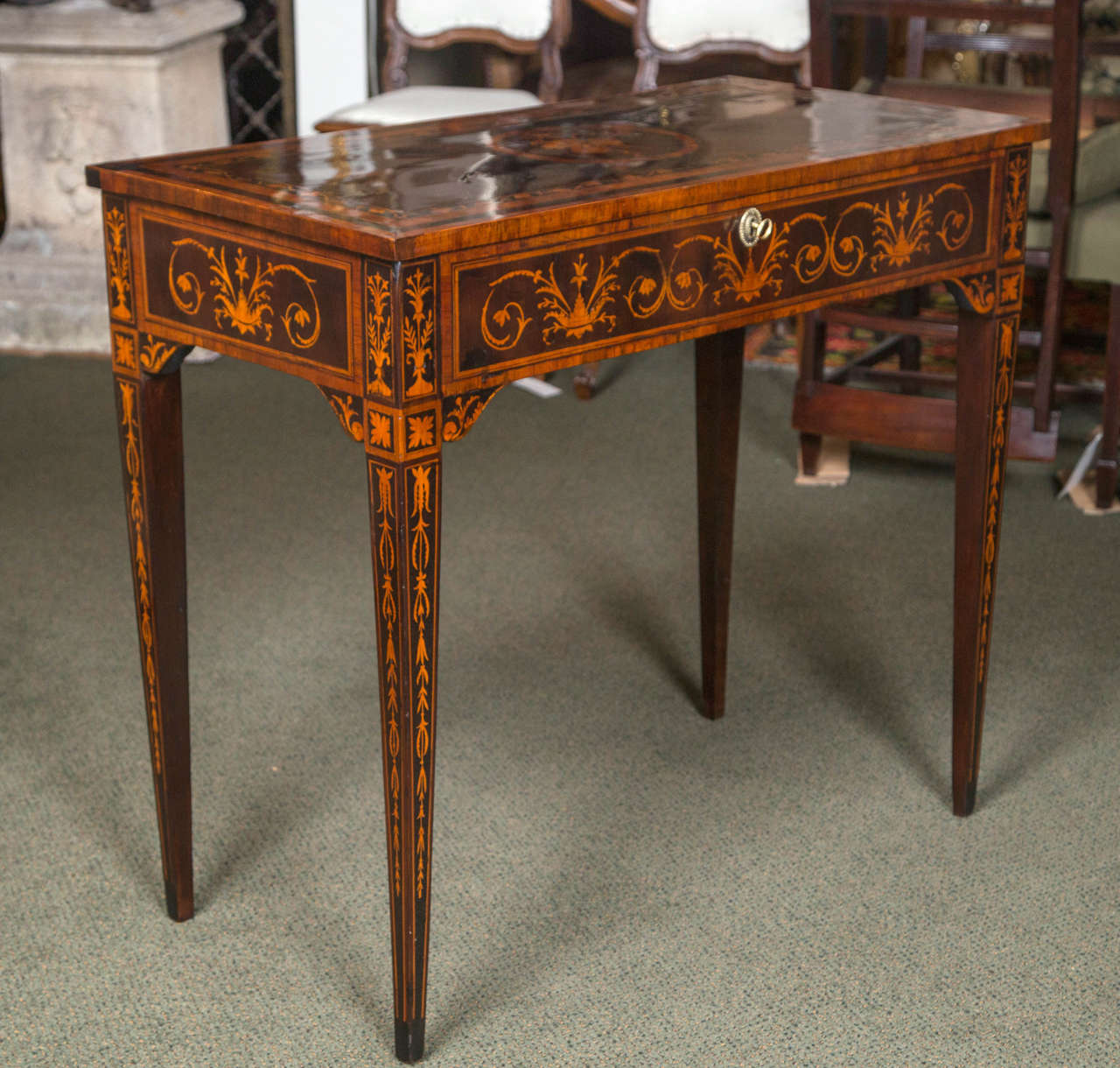 A wonderful inlaid and marquetry Italian work table. Very fine marquetry work. Provenance: Delmonico's Tucci estate.