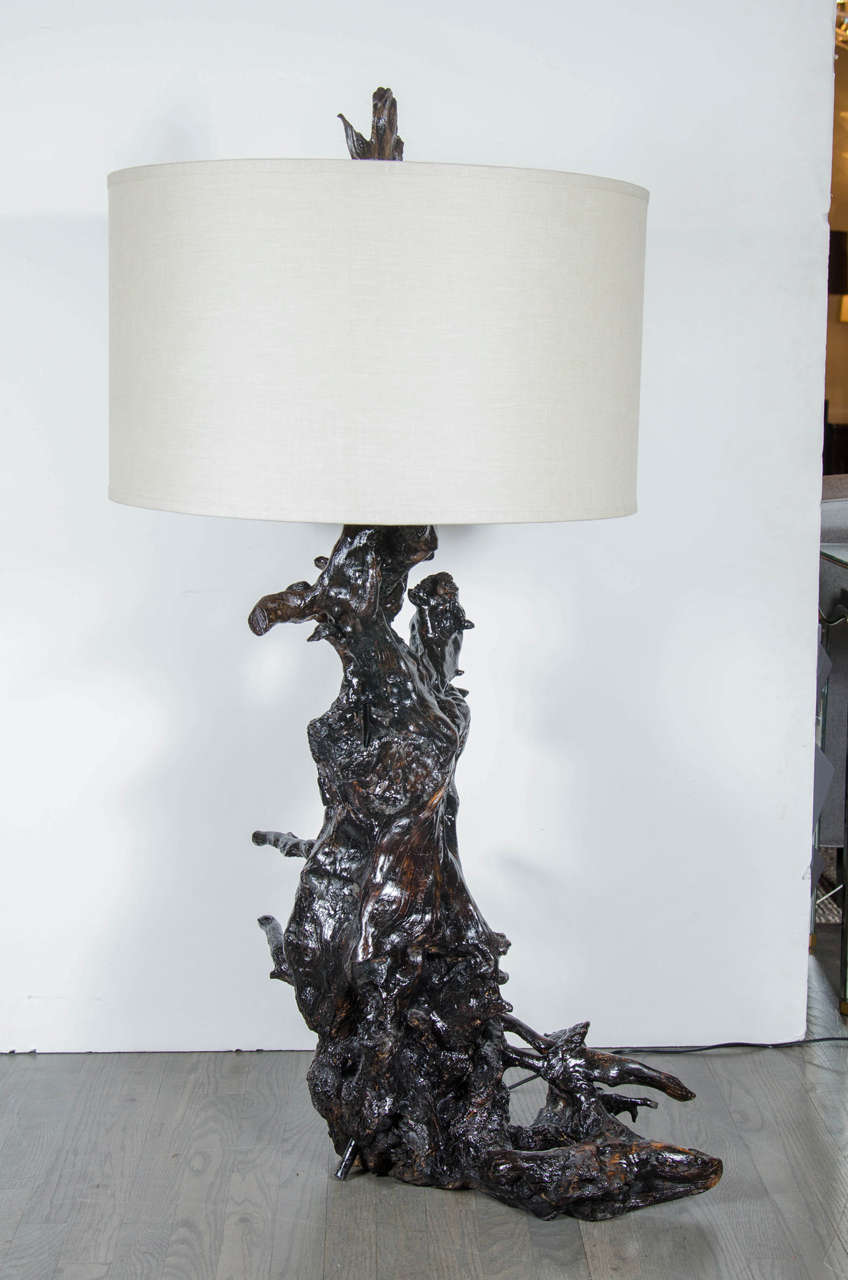 This very sophisticated table lamp is made of naturalistic driftwood in root form.This has been newly electrified and fitted with a custom shade.