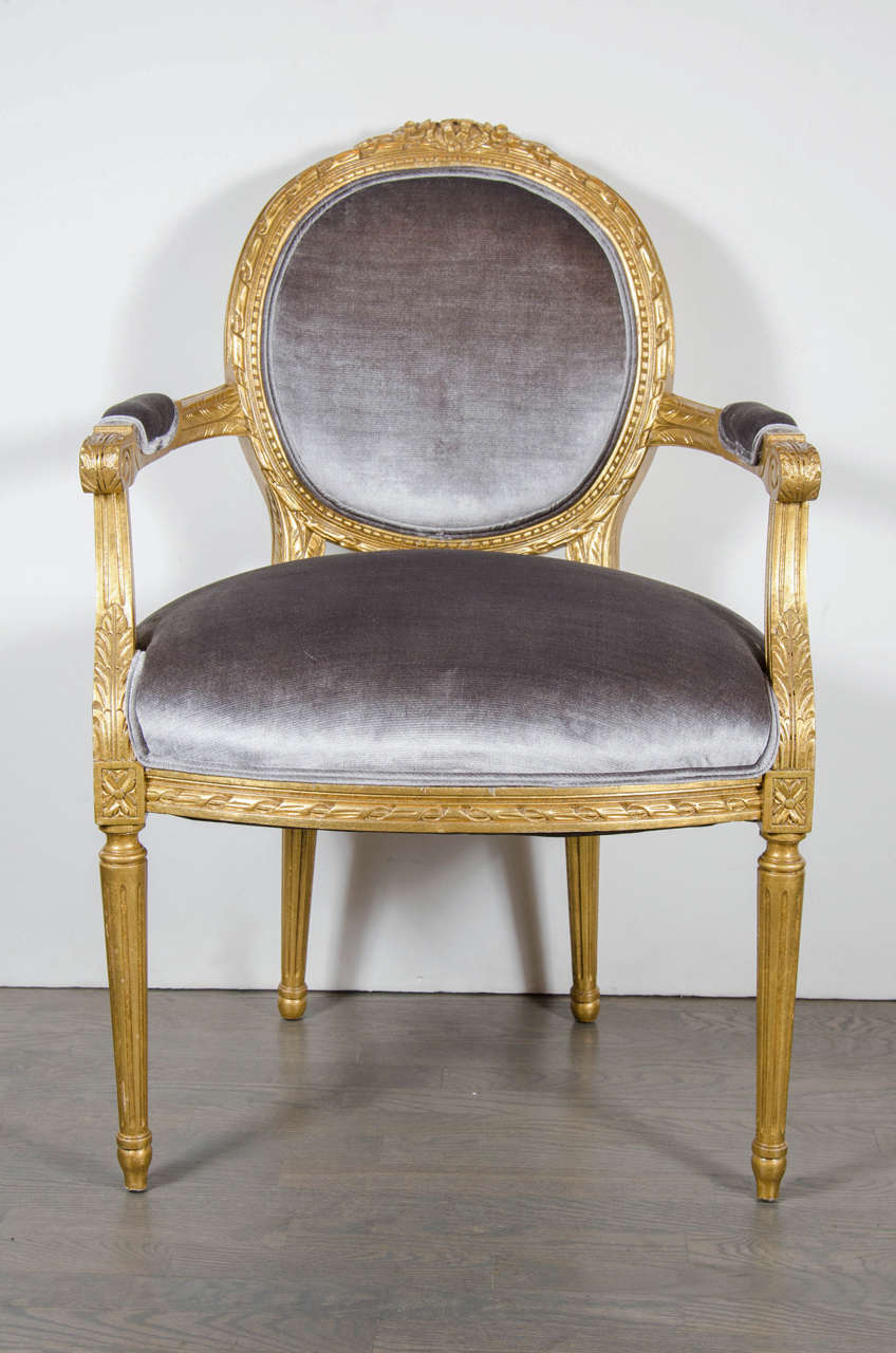 Mid-20th Century Set of 12 Louis XIV Style Hand-Carved 24-Karat Gilded Dining Chairs